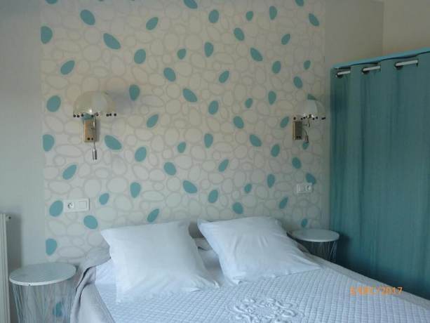 Imagen de la habitación del Logis Hotel Les Tilleuls. Foto 11