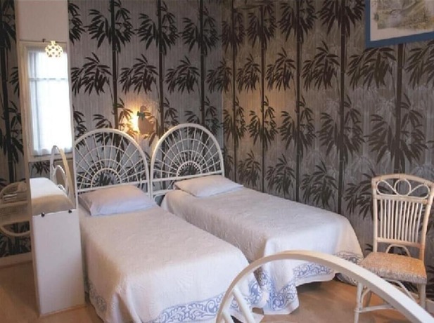 Imagen de la habitación del Logis Hotel Les Tilleuls. Foto 19