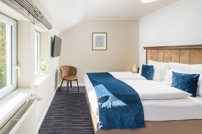 Imagen de la habitación del Logis Hotel QUARTIER 5. Foto 11