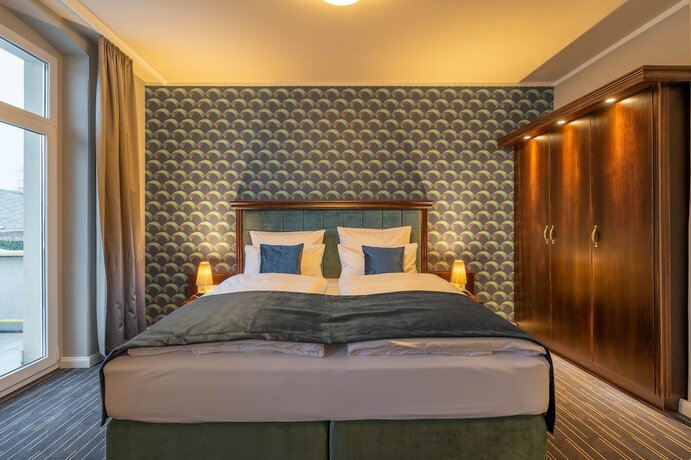 Imagen de la habitación del Logis Hotel QUARTIER 5. Foto 14