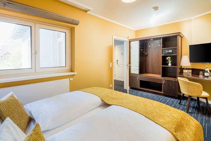 Imagen de la habitación del Logis Hotel QUARTIER 5. Foto 16