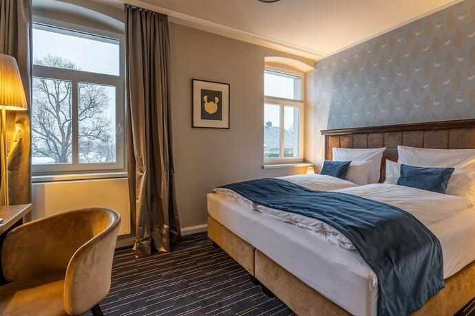 Imagen de la habitación del Logis Hotel QUARTIER 5. Foto 17