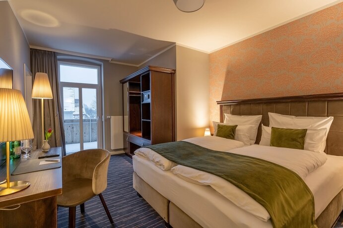 Imagen de la habitación del Logis Hotel QUARTIER 5. Foto 18