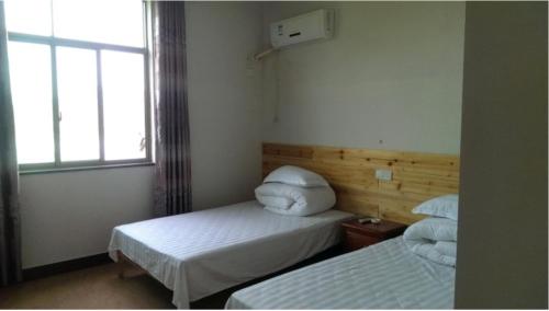 Imagen de la habitación del Long Wei Yan Inn. Foto 4