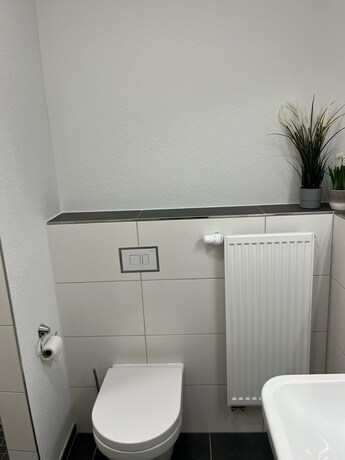 Imagen de la habitación del Longhouse Aparthotel. Foto 19