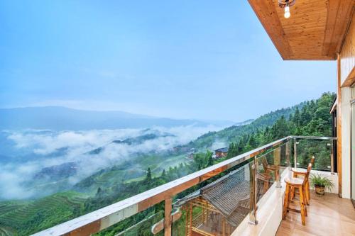 Imagen de la habitación del Longji Panorama Hotel 龙脊全景楼大酒店. Foto 13