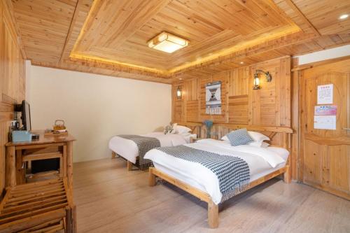 Imagen de la habitación del Longji Panorama Hotel 龙脊全景楼大酒店. Foto 15