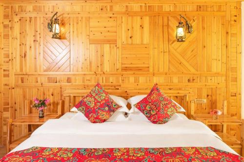 Imagen de la habitación del Longji Panorama Hotel 龙脊全景楼大酒店. Foto 17