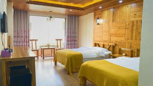 Imagen de la habitación del Longji Panorama Hotel 龙脊全景楼大酒店. Foto 18