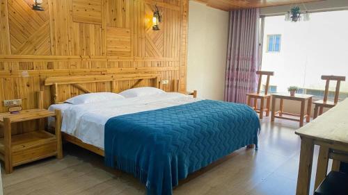 Imagen de la habitación del Longji Panorama Hotel 龙脊全景楼大酒店. Foto 20