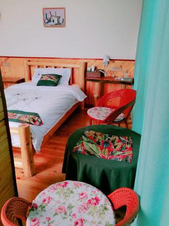 Imagen de la habitación del Longji Rice Terraces Daoyi Homestay. Foto 6