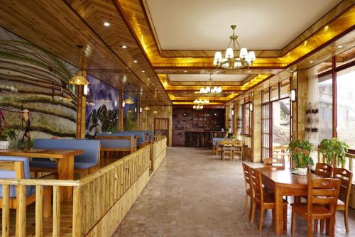 Imagen del bar/restaurante del Longji Rice Terraces Daoyi Homestay. Foto 5