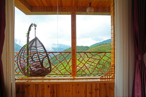 Imagen de la habitación del Longsheng Longji Colorful Cloud Zhenpin Hotel. Foto 6