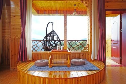 Imagen de la habitación del Longsheng Longji Colorful Cloud Zhenpin Hotel. Foto 8