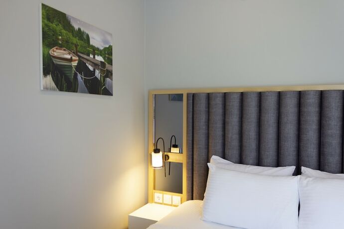 Imagen de la habitación del L\'opera Deluxe Hotel. Foto 13