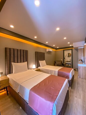 Imagen de la habitación del L\'opera Deluxe Hotel. Foto 19
