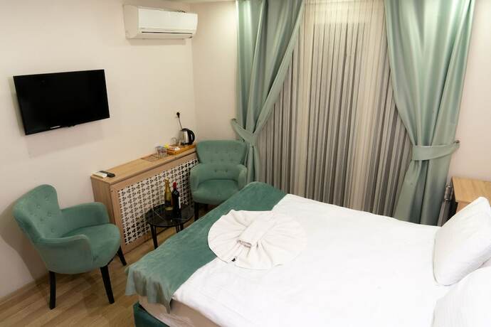 Imagen de la habitación del Loss Hotel. Foto 11