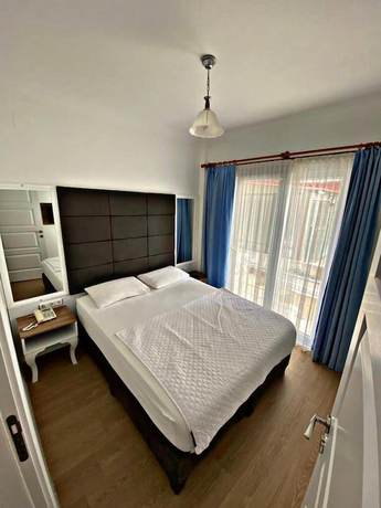 Imagen de la habitación del Lotus Boutique Hotel. Foto 16