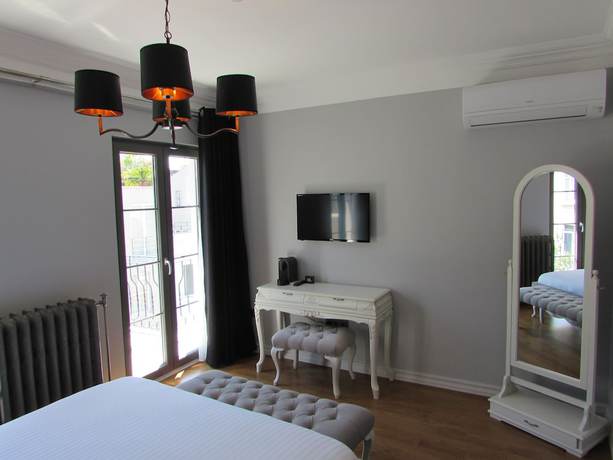 Imagen de la habitación del Louis Rooms. Foto 8