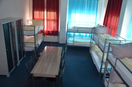 Imagen de la habitación del Low Budget Hostel. Foto 16