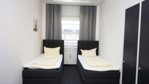 Imagen de la habitación del Low Budget Hostel. Foto 18