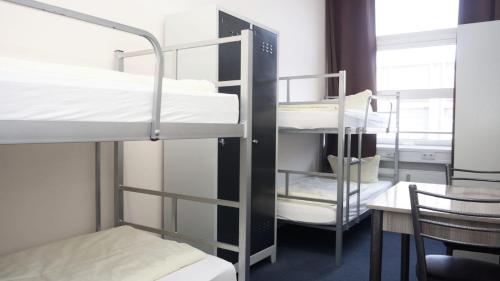 Imagen de la habitación del Low Budget Hostel. Foto 19