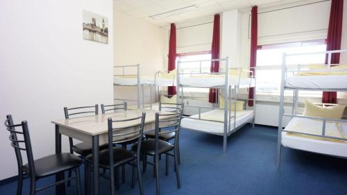 Imagen de la habitación del Low Budget Hostel. Foto 20