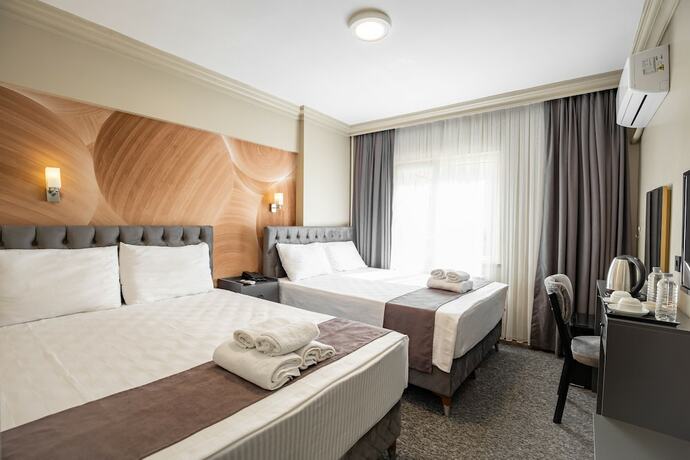 Imagen de la habitación del Loyal City Hotel. Foto 13