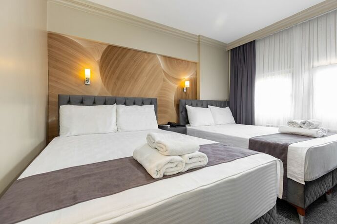Imagen de la habitación del Loyal City Hotel. Foto 17
