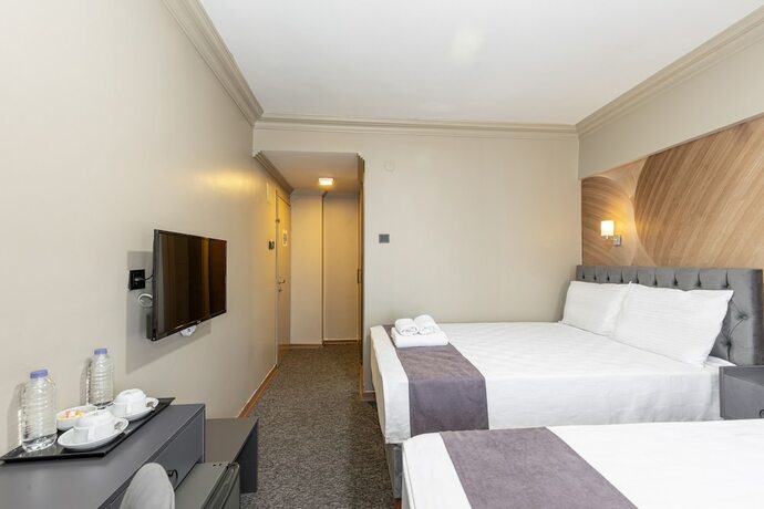Imagen de la habitación del Loyal City Hotel. Foto 18