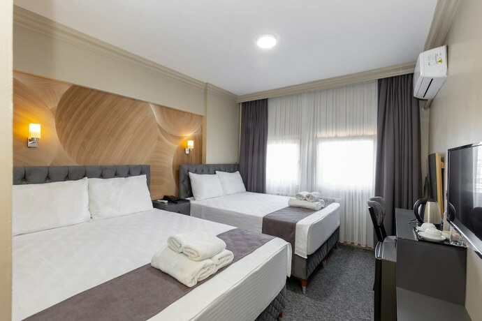 Imagen de la habitación del Loyal City Hotel. Foto 19