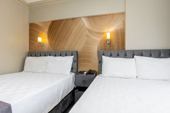 Imagen de la habitación del Loyal City Hotel. Foto 20