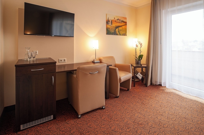 Imagen de la habitación del LuCA HOTEL. Foto 15