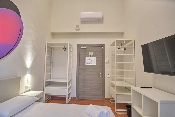 Imagen de la habitación del Lucca Hostel and Rooms San Frediano. Foto 7