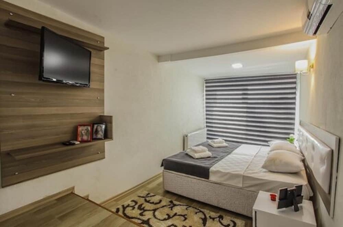 Imagen de la habitación del Luce Suite Hotel. Foto 10