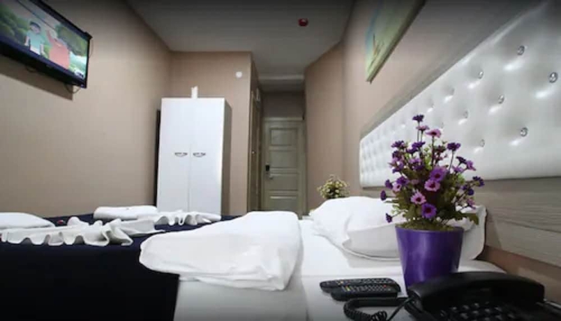 Imagen de la habitación del Luce Suite Hotel. Foto 11
