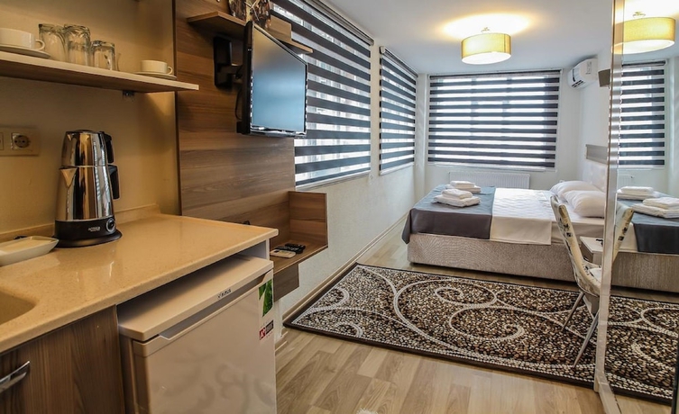 Imagen de la habitación del Luce Suite Hotel. Foto 12