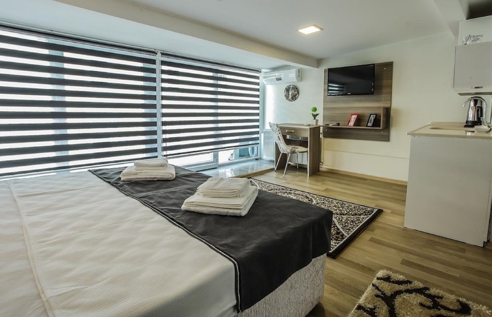 Imagen de la habitación del Luce Suite Hotel. Foto 13