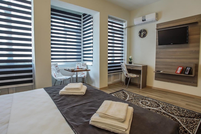 Imagen de la habitación del Luce Suite Hotel. Foto 15