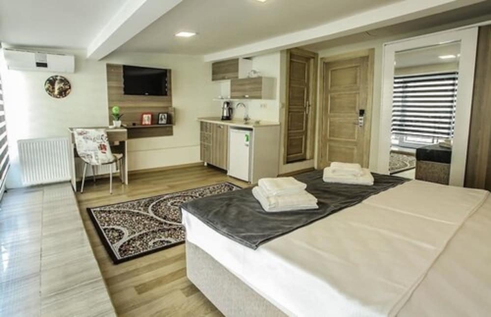Imagen de la habitación del Luce Suite Hotel. Foto 16