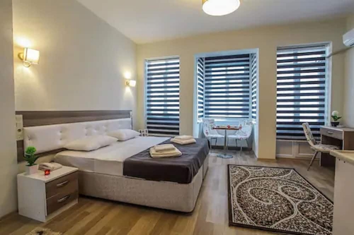 Imagen de la habitación del Luce Suite Hotel. Foto 17