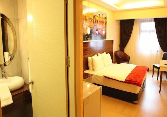 Imagen de la habitación del Lucid Otel. Foto 16