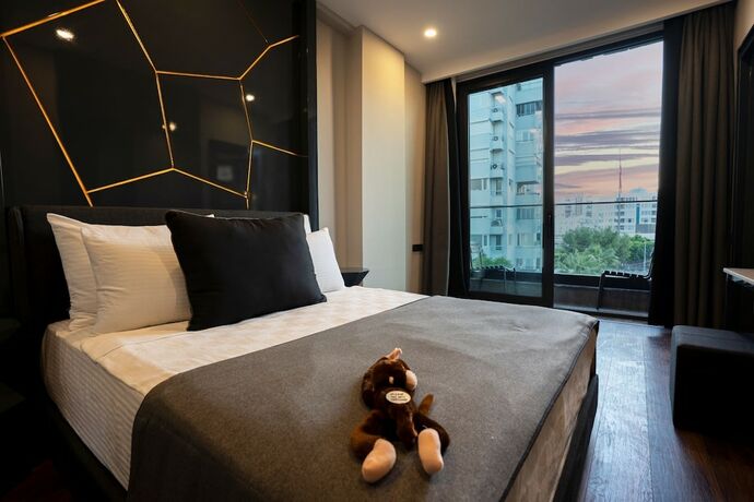 Imagen de la habitación del Lucky Monkey Hotel. Foto 17