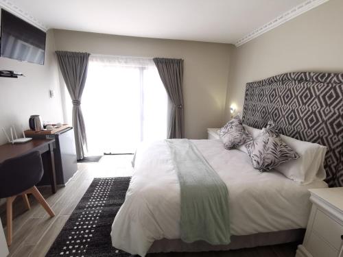 Imagen general del Lucolo Palace B&B - East London. Foto 4