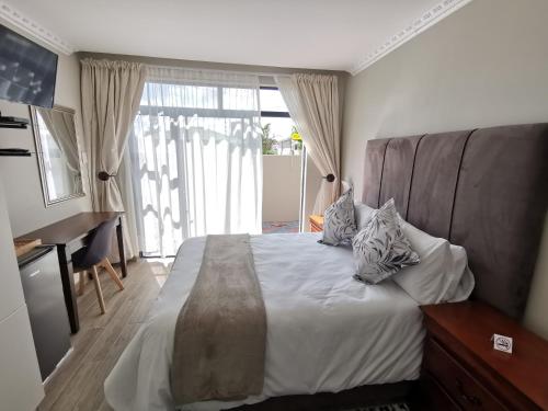Imagen general del Lucolo Palace B&B - East London. Foto 6
