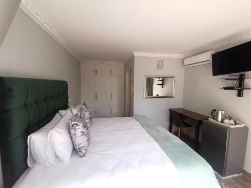 Imagen general del Lucolo Palace B&B - East London. Foto 12