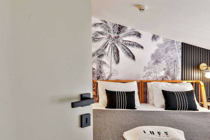 Imagen de la habitación del Luff Suites. Foto 17