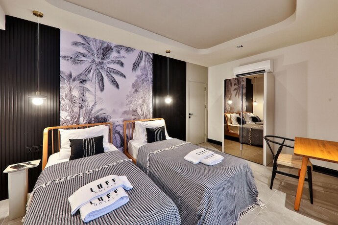 Imagen de la habitación del Luff Suites. Foto 18