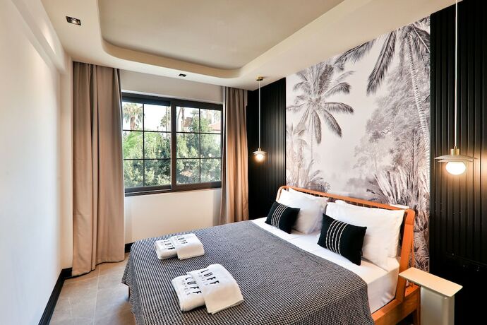 Imagen de la habitación del Luff Suites. Foto 19