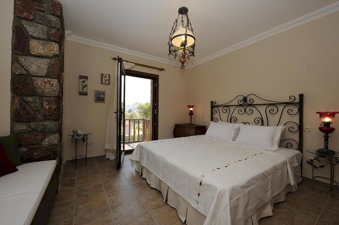 Imagen de la habitación del Lunabegonvil Tas Evler. Foto 11